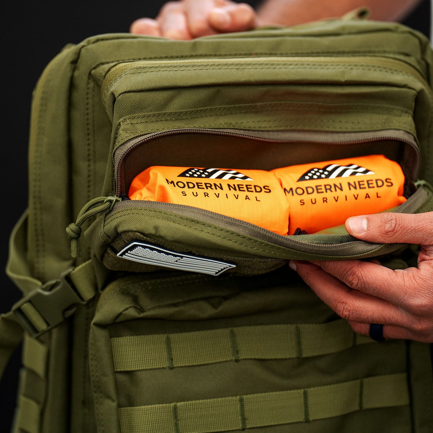 Green 40L tactical backpack top pocket can put two emergency sleeping bag