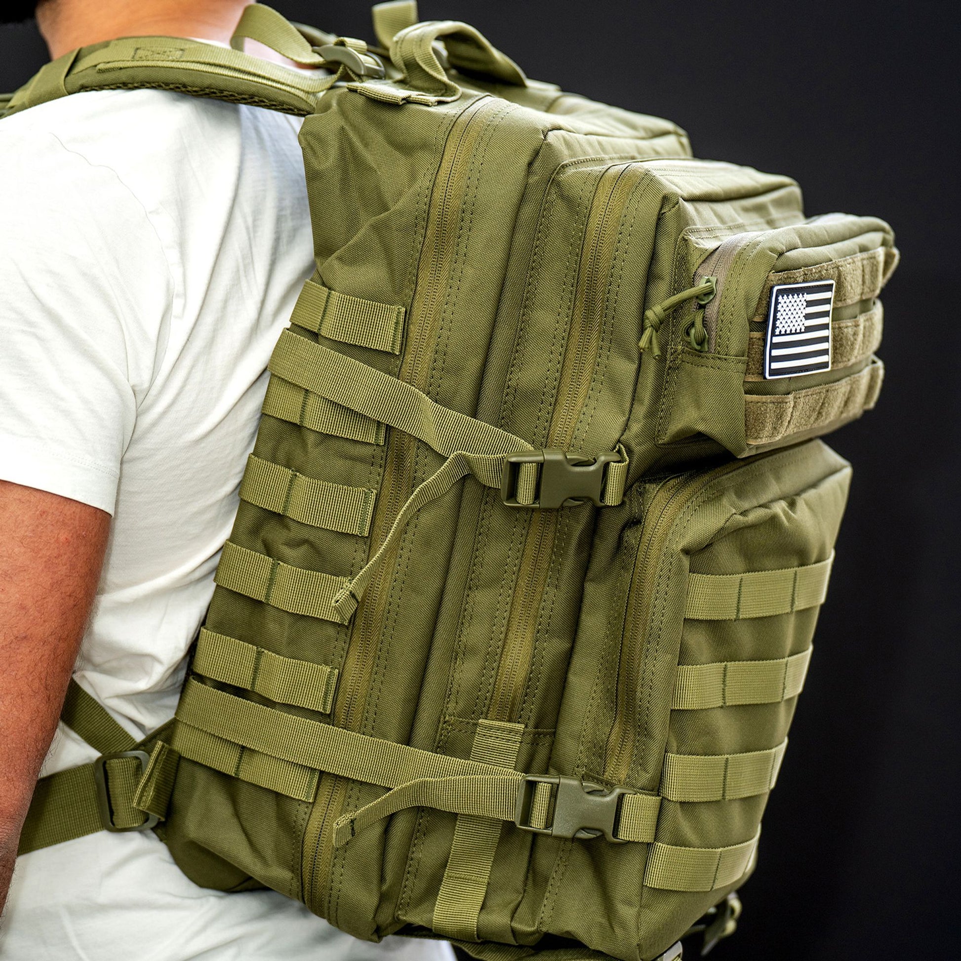 side view of the green tactical backpack