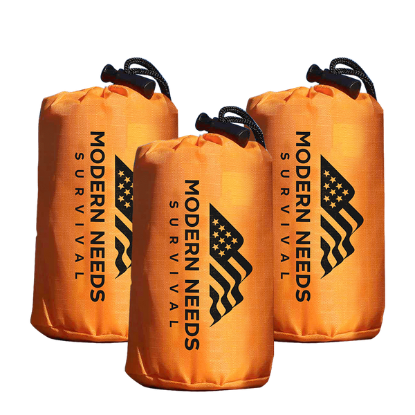 Upright images of three Modern Needs emergency sleeping bags